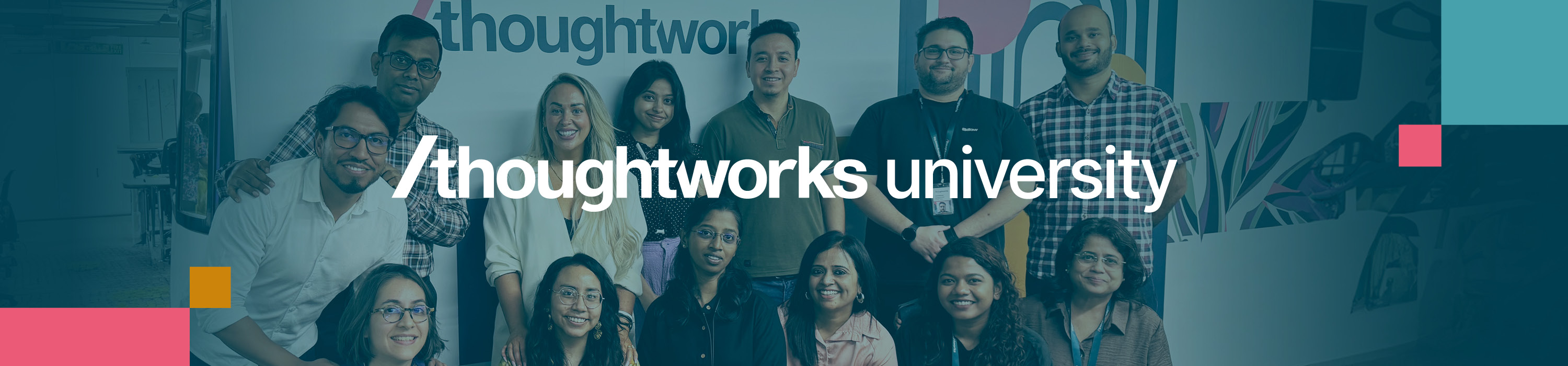 Group of Thoughtworkers in front of a blue wall featuring the Thoughtworks University logo in bold white text. Group of Thoughtworkers in front of a blue wall featuring the Thoughtworks University logo in bold white text.
