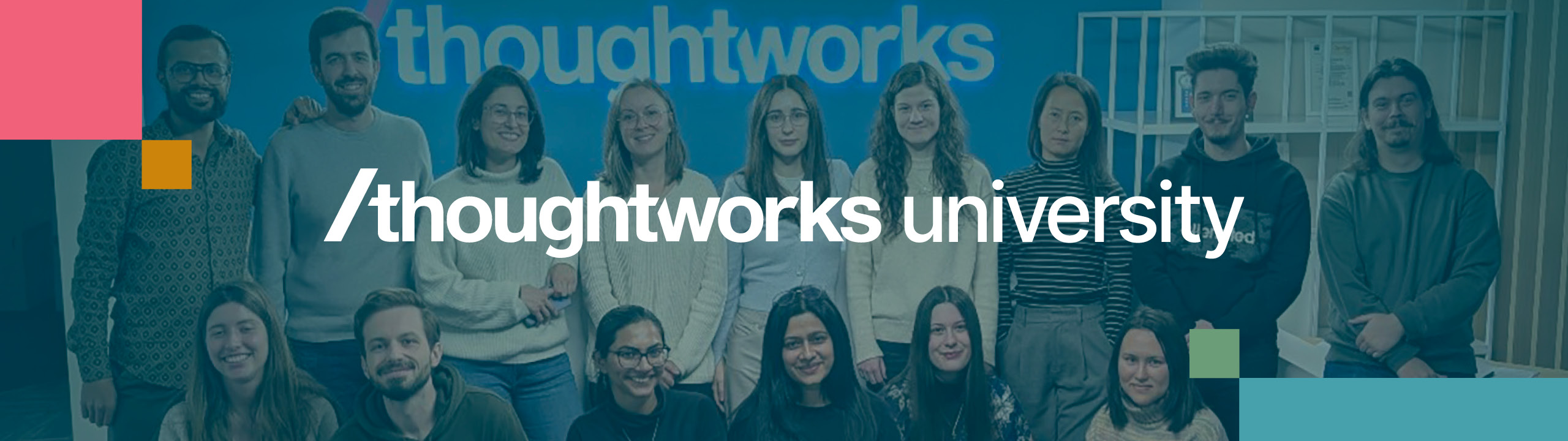 Group of Thoughtworkers in front of a blue wall featuring the Thoughtworks University logo in bold white text. Group of Thoughtworkers in front of a blue wall featuring the Thoughtworks University logo in bold white text.
